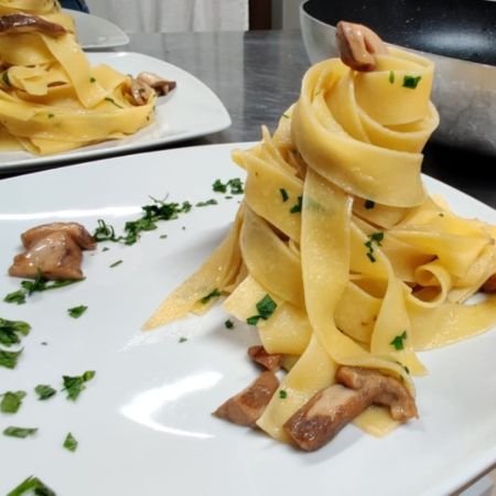 pasta on a plate with mushrooms